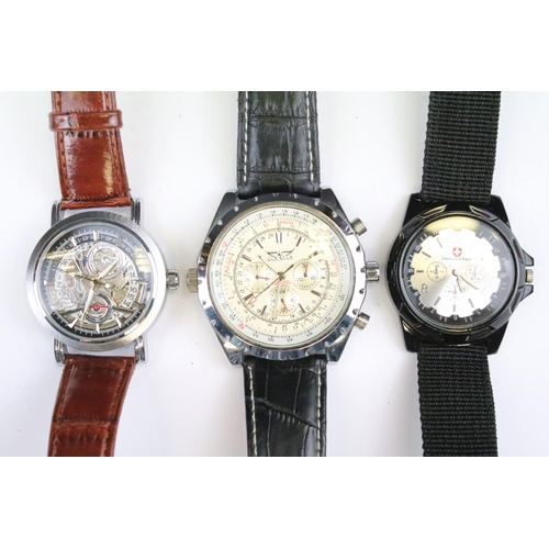 422 - A collection of thirteen contemporary automatic and quartz wristwatches to include a Daniel Hechter ... 