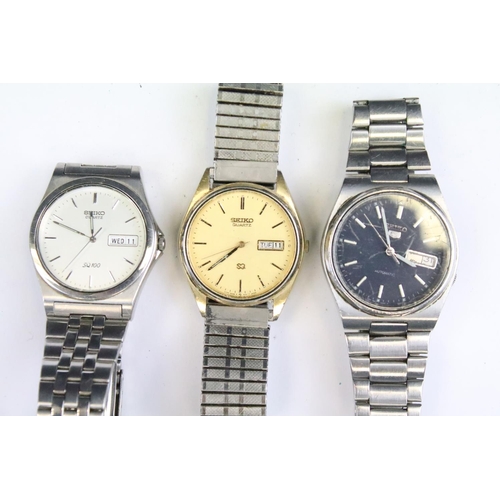 423 - A collection of nine Seiko automatic and quartz wristwatches to include Seiko 5 and Seiko SQ example... 