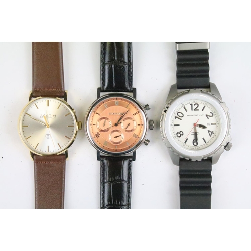 427 - A collection of thirty five mainly contemporary gents quartz watches to include Timex, Accurist, Avi... 