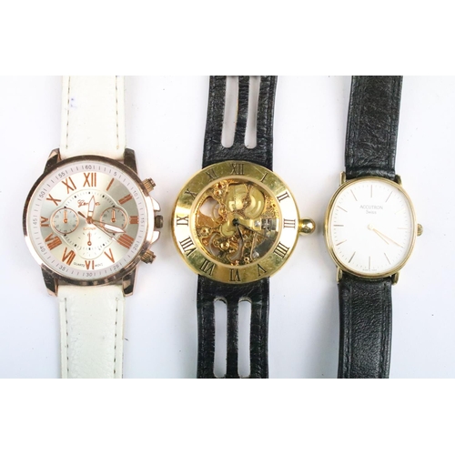 434 - A collection of twenty five mainly contemporary quartz ladies and gents wristwatches to include anal... 