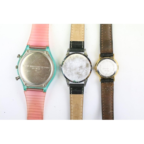 434 - A collection of twenty five mainly contemporary quartz ladies and gents wristwatches to include anal... 