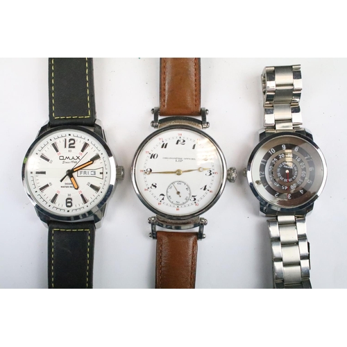 434 - A collection of twenty five mainly contemporary quartz ladies and gents wristwatches to include anal... 