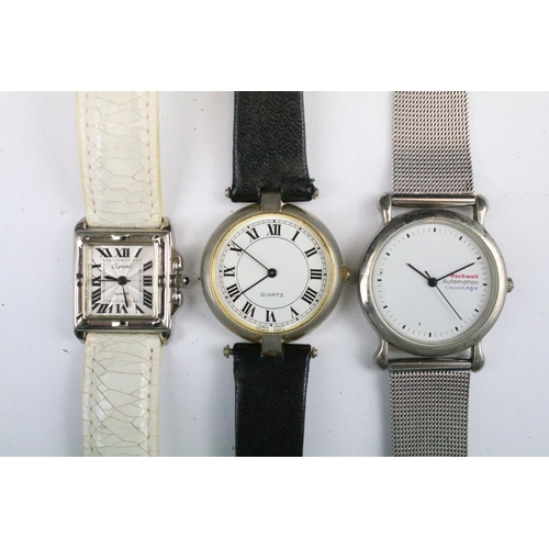 434 - A collection of twenty five mainly contemporary quartz ladies and gents wristwatches to include anal... 