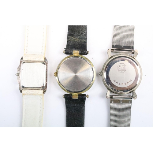 434 - A collection of twenty five mainly contemporary quartz ladies and gents wristwatches to include anal... 