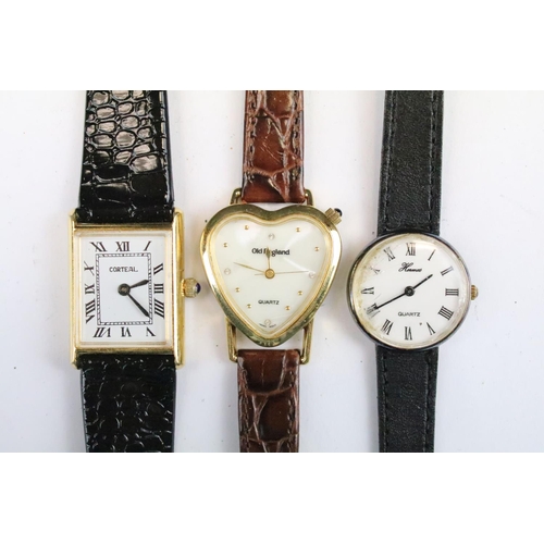 434 - A collection of twenty five mainly contemporary quartz ladies and gents wristwatches to include anal... 