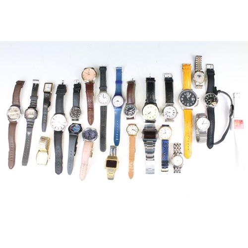 435 - A collection of twenty five mainly contemporary quartz ladies and gents wristwatches to include anal... 