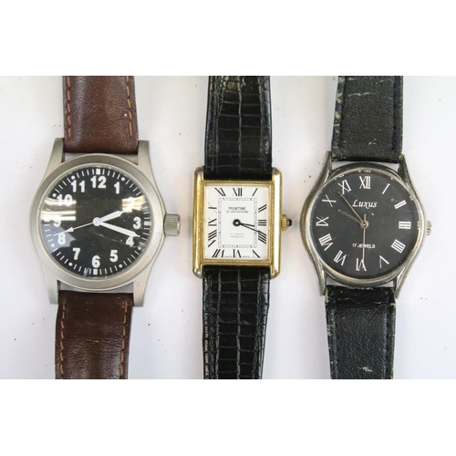 435 - A collection of twenty five mainly contemporary quartz ladies and gents wristwatches to include anal... 