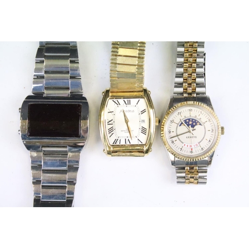 435 - A collection of twenty five mainly contemporary quartz ladies and gents wristwatches to include anal... 