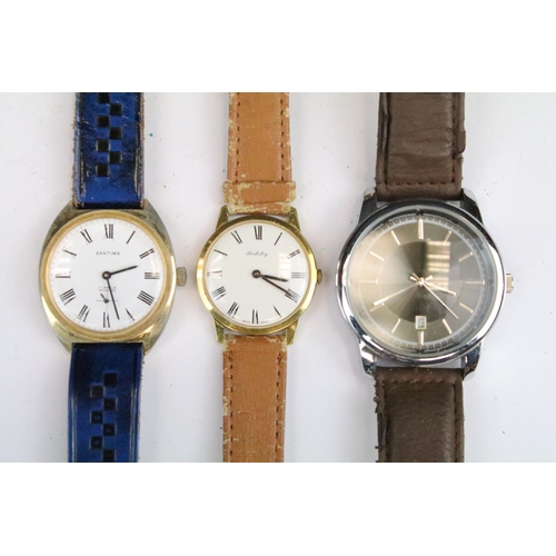 435 - A collection of twenty five mainly contemporary quartz ladies and gents wristwatches to include anal... 