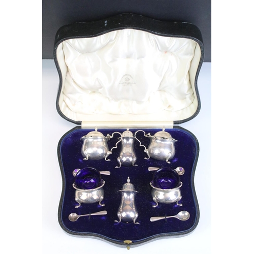 552 - Cased Mappin & Webb silver cruet set consisting of two mustard pots, two table salts and two pepper ... 