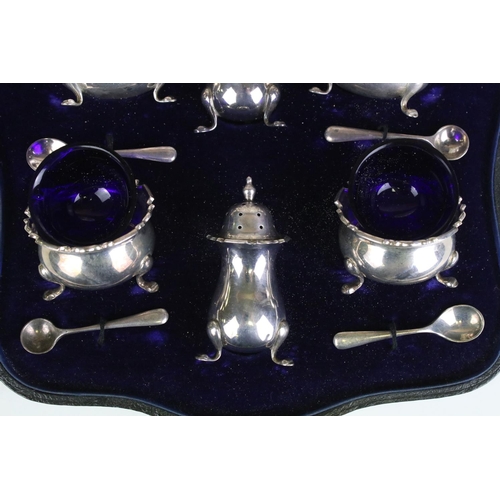 552 - Cased Mappin & Webb silver cruet set consisting of two mustard pots, two table salts and two pepper ... 