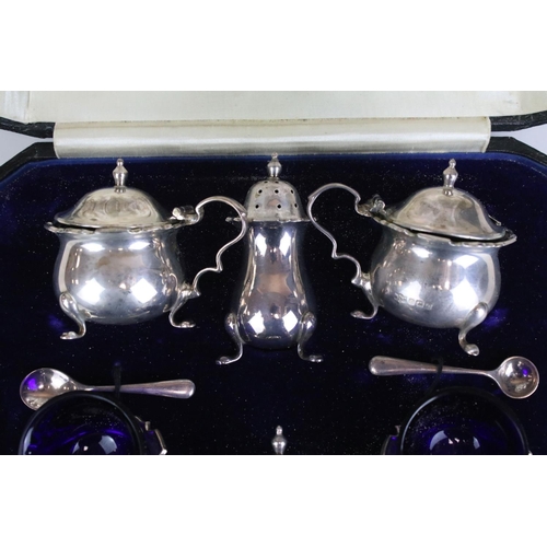 552 - Cased Mappin & Webb silver cruet set consisting of two mustard pots, two table salts and two pepper ... 