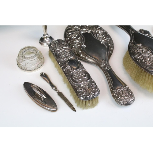 556 - Collection of early 20th Century vanity items most having repousse detailed backs to include a Walke... 