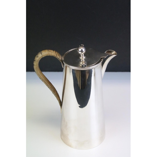 560 - Early 20th Century silver hallmarked coffee pot having moulded rim with wicker handle (hallmarked Bi... 