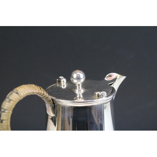 560 - Early 20th Century silver hallmarked coffee pot having moulded rim with wicker handle (hallmarked Bi... 