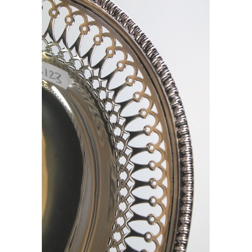 566 - Early 20th Century silver hallmarked footed basket of oval form having a pierced rim with hinged han... 