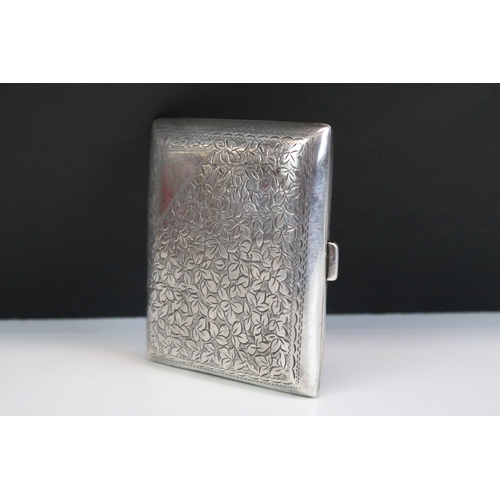 567 - Early 20th Century silver hallmarked cigarette case having engraved foliated detailing to the case. ... 