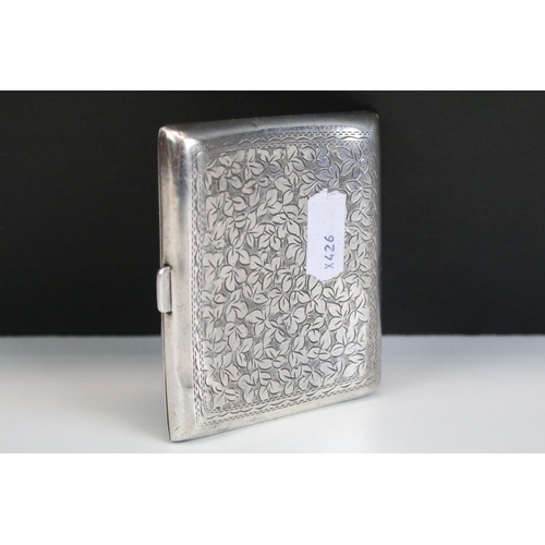 567 - Early 20th Century silver hallmarked cigarette case having engraved foliated detailing to the case. ... 