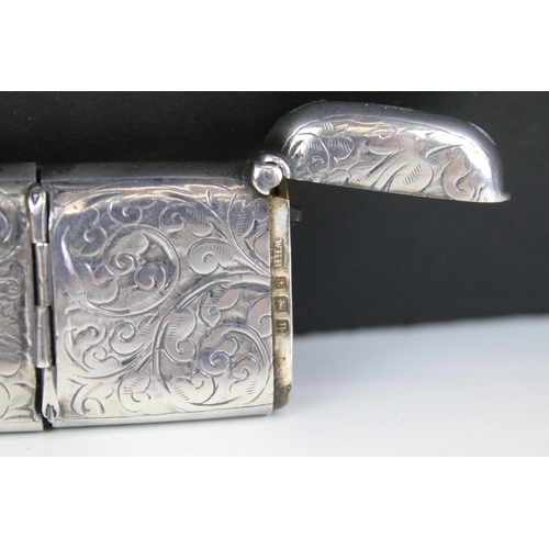 569 - Early 20th Century silver hallmarked wallet with green leatherette interior (hallmarked Birmingham 1... 