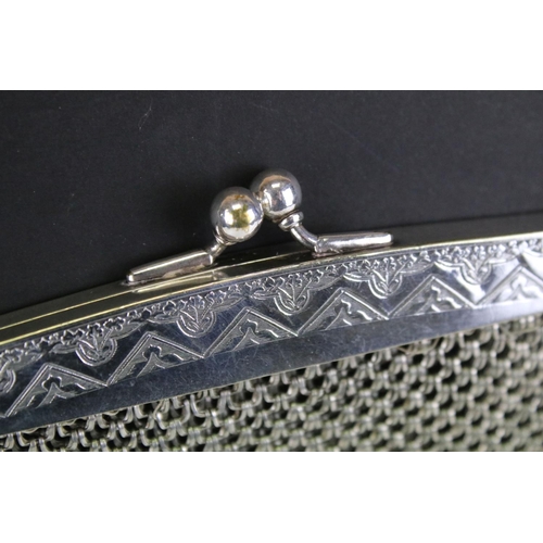 570 - German white metal mesh purse having a hinged clasp to top with scalloped white metal mesh body. Mar... 