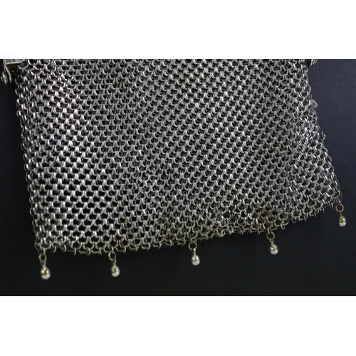 570 - German white metal mesh purse having a hinged clasp to top with scalloped white metal mesh body. Mar... 