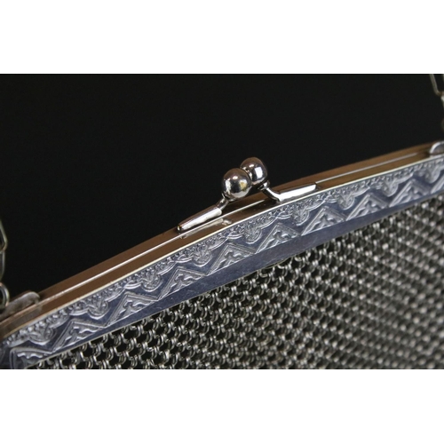 570 - German white metal mesh purse having a hinged clasp to top with scalloped white metal mesh body. Mar... 