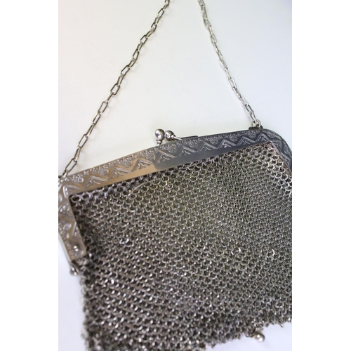 570 - German white metal mesh purse having a hinged clasp to top with scalloped white metal mesh body. Mar... 