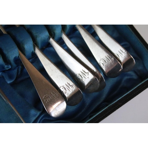 573 - 19th Century Victorian silver hallmarked tea spoons and sugar tongs cased set to include eleven teas... 