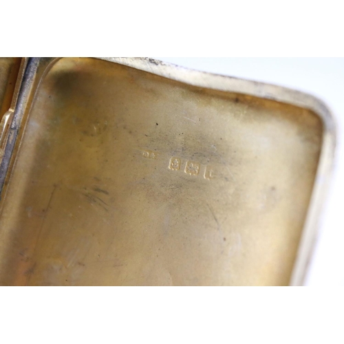 643 - Three silver cigarette cases to include a late Victorian example with engraved scrolling decoration,... 