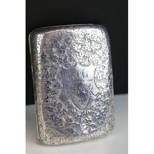 643 - Three silver cigarette cases to include a late Victorian example with engraved scrolling decoration,... 