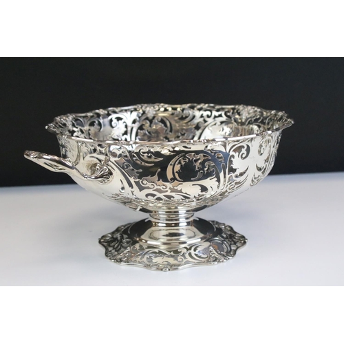 649 - Early 20th Century silver hallmarked twin handled basket with pierced foliate details throughout and... 