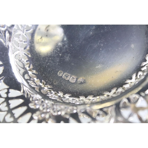 655 - Pair of Victorian silver hallmarked pin dishes each having pierced rims with moulded floral details.... 