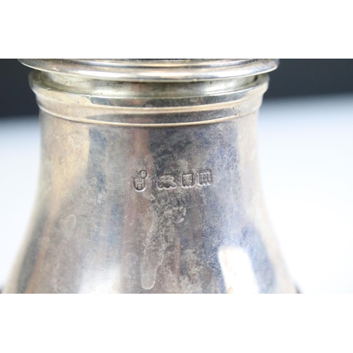 658 - Early 20th Century silver hallmarked sugar shaker of baluster form with pierced finial top lid. Hall... 