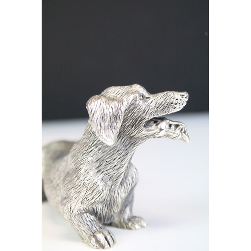 679 - Silver hallmarked Daschund dog figurine having moulded details. Import marked 1993. Measures 10cm wi... 