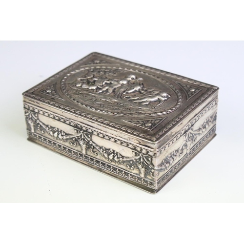 680 - Early 20th Century continental silver lidded box having moulded classical detailing featuring putti ... 