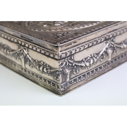 680 - Early 20th Century continental silver lidded box having moulded classical detailing featuring putti ... 