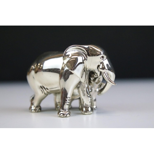 681 - Silver hallmarked elephant figurine in the form of a mother and calf. Hallmarked Sheffield 925 to ba... 