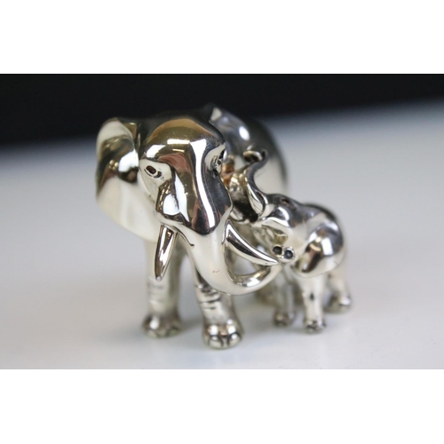 681 - Silver hallmarked elephant figurine in the form of a mother and calf. Hallmarked Sheffield 925 to ba... 