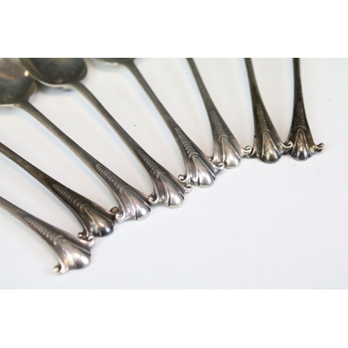 684 - Set of 19th Century Victorian tea spoons and sugar tongs having scrolled terminals. Hallmarked Londo... 