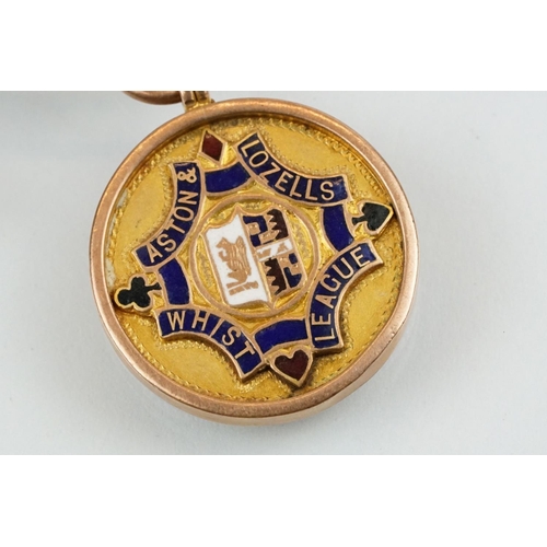 398 - 9ct gold hallmarked double albert chain with 9ct T bar and 9ct enamelled fob medal. The chain constr... 