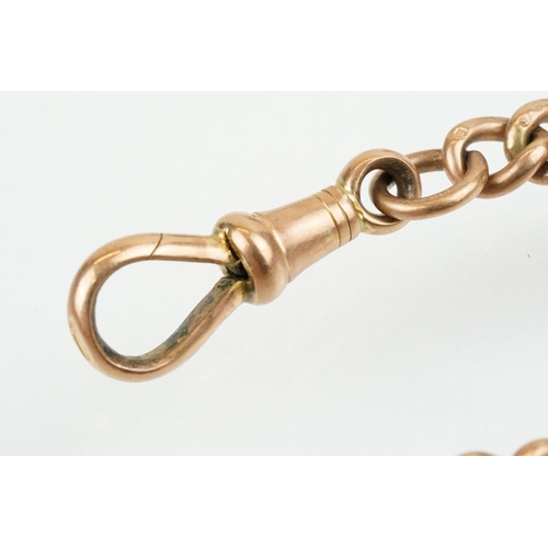 398 - 9ct gold hallmarked double albert chain with 9ct T bar and 9ct enamelled fob medal. The chain constr... 