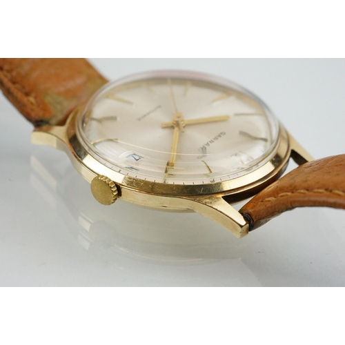 505 - Garrard automatic gold plated wrist watch having a silver tone sunburst dial, gilt baton markers to ... 