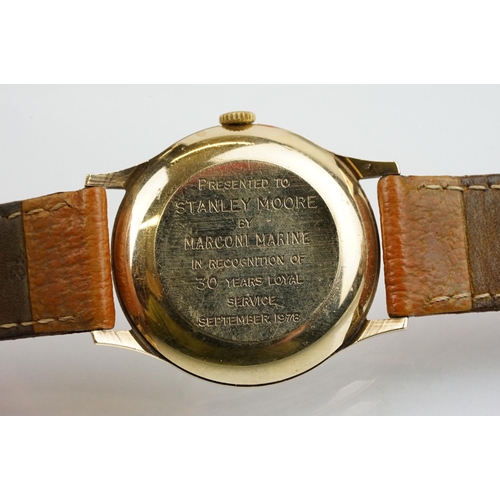 505 - Garrard automatic gold plated wrist watch having a silver tone sunburst dial, gilt baton markers to ... 