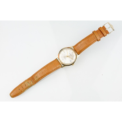 505 - Garrard automatic gold plated wrist watch having a silver tone sunburst dial, gilt baton markers to ... 