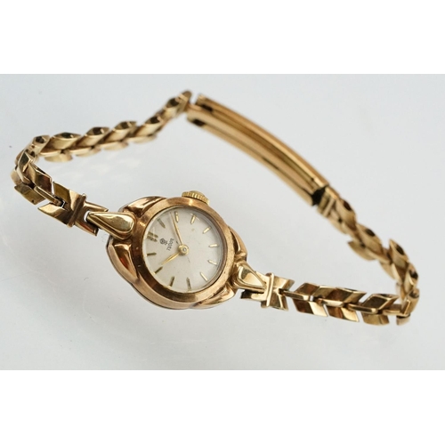 506 - 9ct gold Tudor ladies wrist watch having a round face with baton markers to the chapter ring mounted... 