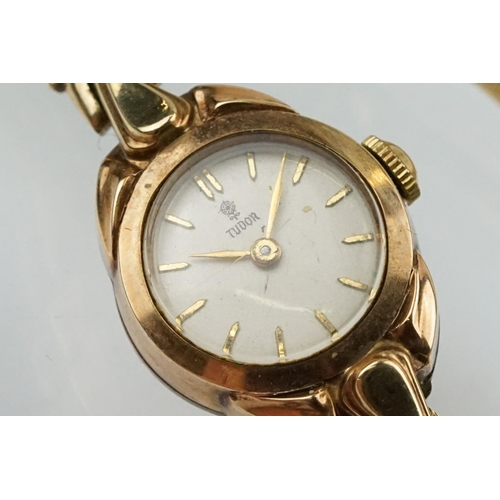 506 - 9ct gold Tudor ladies wrist watch having a round face with baton markers to the chapter ring mounted... 