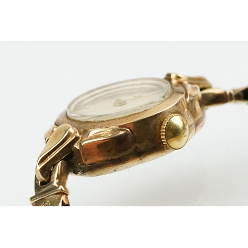 506 - 9ct gold Tudor ladies wrist watch having a round face with baton markers to the chapter ring mounted... 