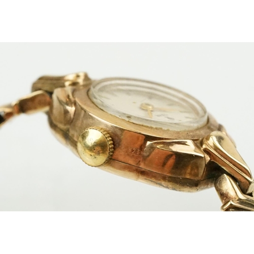 506 - 9ct gold Tudor ladies wrist watch having a round face with baton markers to the chapter ring mounted... 