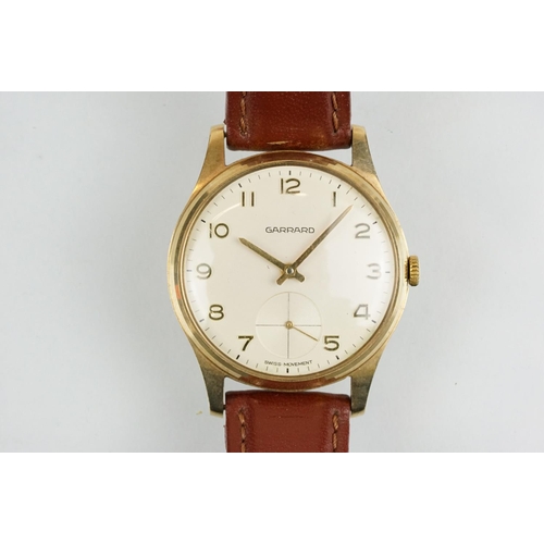 507 - Garrard gold plated wrist watch having a cream dial with arabic numerals to the chapter ring and sub... 