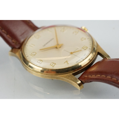 507 - Garrard gold plated wrist watch having a cream dial with arabic numerals to the chapter ring and sub... 